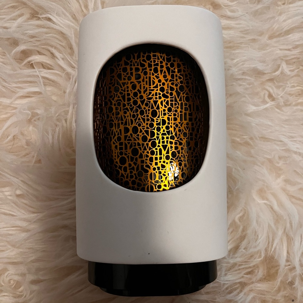 Electric diptyque air diffuser
